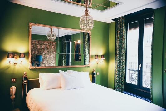 Image of hotel room showing bed